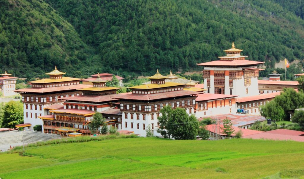 A captivating shot of Ta Dzong, formerly a watchtower and now the National Museum of Bhutan, showcasing its unique circular structure.