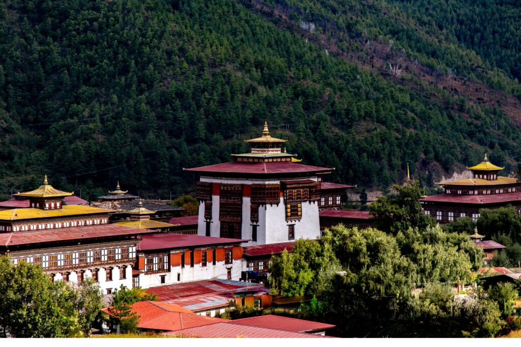 Scenic landscape showcasing the confluence of Paro and Thimphu rivers at Chuzom, with lush greenery and serene waters.