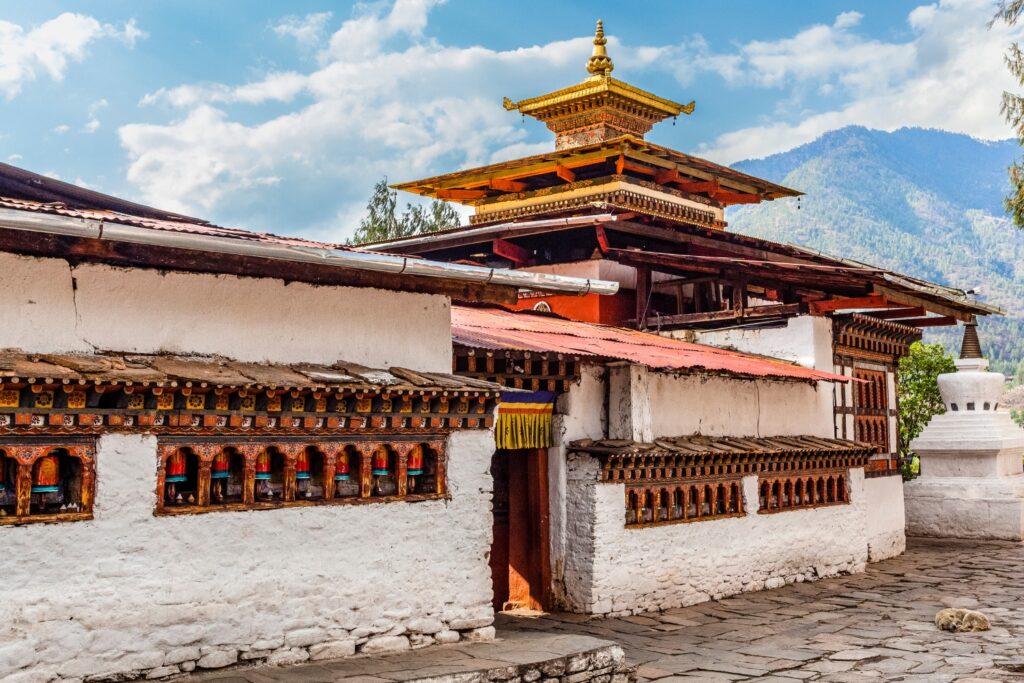Peaceful image of Kyichu Lhakhang, one of the oldest temples in Bhutan, showcasing its intricate architecture and serene surroundings.